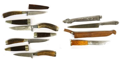 Lot 213 - An Argentinian Gaucho Knife, each side of the...