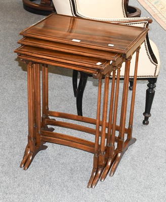 Lot 1178 - A Set of Mahogany Quartetto Tables, largest...