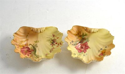 Lot 262 - A pair of Royal Worcester shell bonbon dishes printed with flowers on graduated ground, 10cm