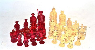 Lot 266 - Early 20th century stained ivory chess set