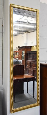 Lot 1294 - A Gilt Framed Hall Mirror, 136cm by 43cm