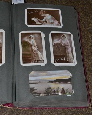 Lot 275 - An album of postcards including silks, Gladys Cooper, greeting cards etc