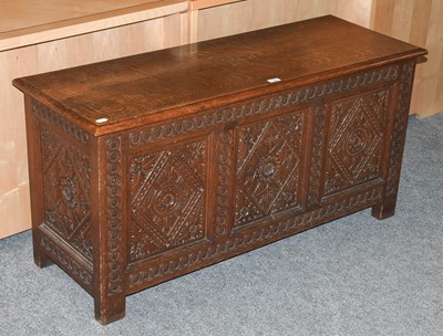 Lot 1142 - A Early 20th Century Carved Oak Coffer, the...