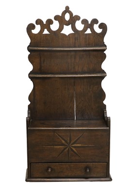 Lot 738 - A George III Oak Spoon Rack, late 18th century,...