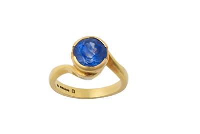 Lot 2080 - An 18 Carat Gold Sapphire Ring the round cut...