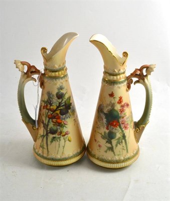 Lot 282 - A pair of Royal Worcester conical ewers, decorated with flowering thistles, 31.5cm