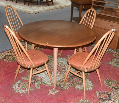 Lot 1140 - An Ercol Light Elm Drop Leaf Table, 124cm by...