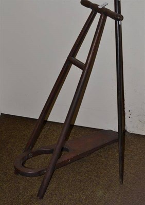 Lot 301 - A boot jack and a novelty walking cane