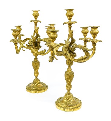 Lot 275 - A Pair of Gilt Bronze Five-Light Candelabra,...