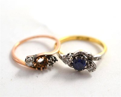 Lot 307 - A sapphire type and diamond three stone twist ring and another, (a.f.) with a loose stone taped...