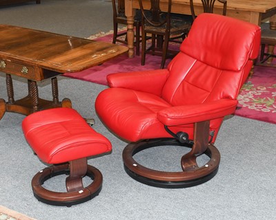 Lot 1166 - A Stressless Red Leather Reclining Armchair,...