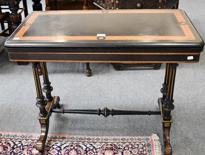 Lot 1221 - A 19th century Ebony and Amboyna Fold Over...