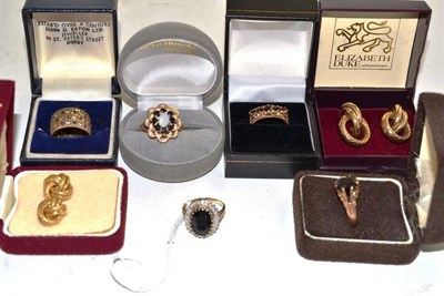 Lot 320 - Five 9ct gold stone set rings and two pairs of knot earrings