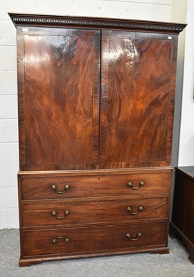 Lot 1215 - A George III Crossbanded Mahogany Linen Press,...