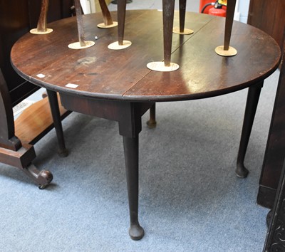 Lot 1238 - A George II Mahogany Gateleg Table, on pad...