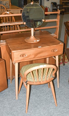 Lot 1139 - A Ercol Light Elm Dressing table, with single...