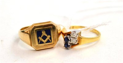 Lot 325 - A 9ct gold masonic swivel ring and a diamond and sapphire ring