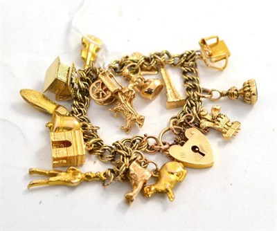 Lot 326 - A double curb bracelet hung with fifteen charms