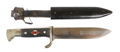 Lot 218 - A Second World War German HJ Knife, one side...