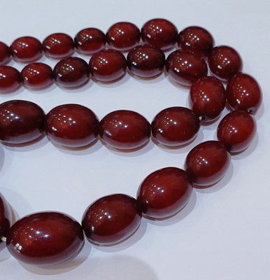 Lot 99 - A Bakelite Bead Necklace, comprising of...