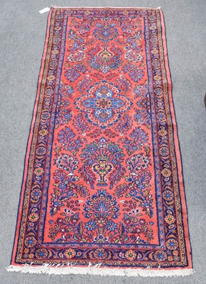 Lot 1248 - Lillian Rug, the blood red field with central...