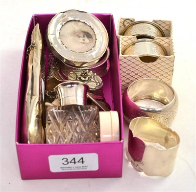 Lot 344 - A collection of small silver items including four napkin rings, a small photograph frames, a...