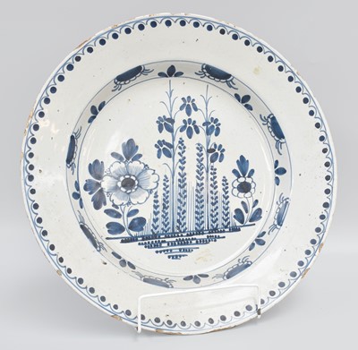 Lot 258 - An 18th Century English Delft Blue and White...