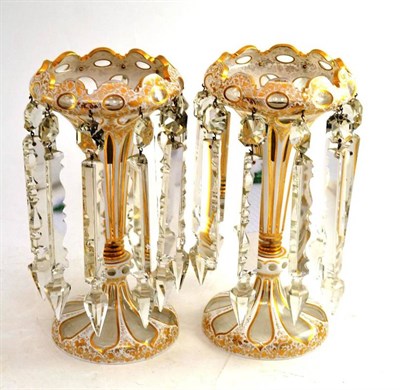 Lot 360 - Pair of white overlay glass lustres and drops with gilt decoration