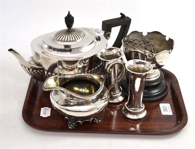 Lot 363 - A hallmarked silver teapot; a Victorian silver milk jug; two loaded silver specimen vases; and...