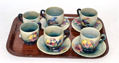 Lot 364 - Six Moorcroft coffee cups and four saucers (a.f.)