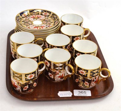 Lot 365 - A part set of Royal Crown Derby, comprising nine cups and saucers