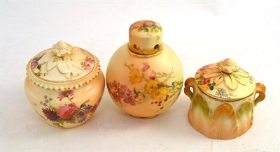 Lot 368 - A Royal Worcester jar and cover printed with flowers on a graduated ground; another similar...