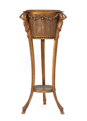 Lot 923 - A Carved Giltwood and Cane Two-Tier Circular...