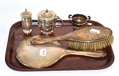 Lot 375 - A silver mirror and brush, mustard and pepper and a small trophy cup