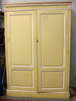 Lot 1228 - A Georgian Cream Painted Two Door Wardrobe,...