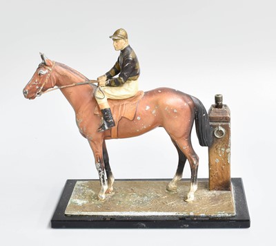 Lot 163 - A Cold Painted Metal Table Lighter, as a horse...