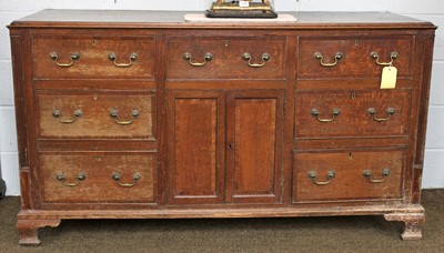 Lot 1107 - An 18th Century Oak Dresser Base, the moulded...