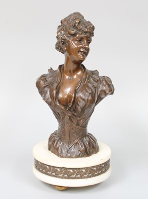 Lot 167 - An Art Nouveau Patinated Bronze Bust of a Girl,...