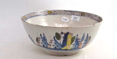 Lot 387 - An 18th century English polychrome Delft bowl (a.f.)