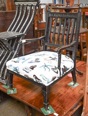 Lot 1338 - An Aesthetic Movement Ebonised Nursing Chair,...