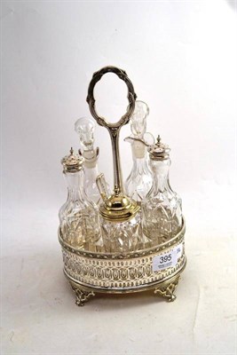 Lot 395 - A five bottle cruet set in a silver plated stand