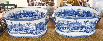 Lot 211 - A Pair of Reproduction Blue Printed Pottery...