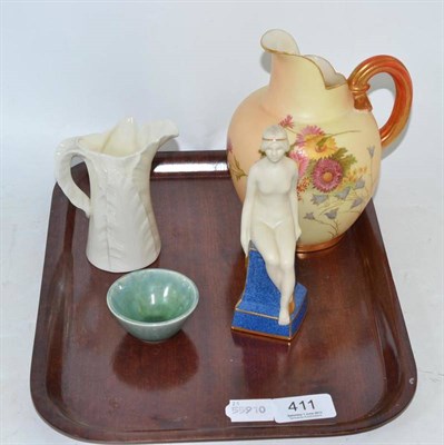 Lot 411 - A Royal Worcester small figure of a girl seated on a powder blue pedestal; a Royal Worcester...