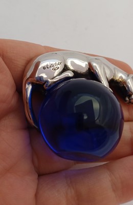 Lot 2255 - A Cartier Silver and Blue Glass Paperweight