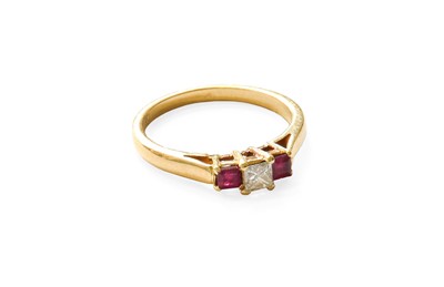 Lot 394 - A Ruby and Diamond Three Stone Ring, the...