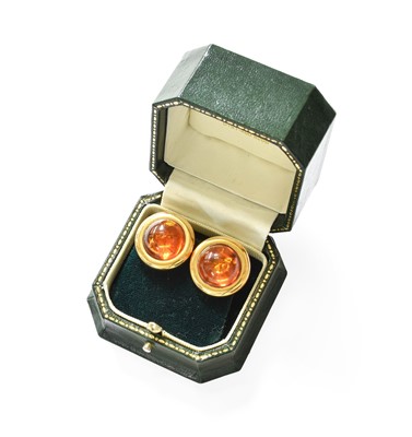 Lot 400 - A Pair of Amber Earrings, the round cabochon...