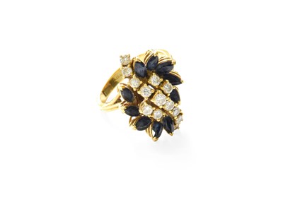 Lot 348 - An 18 Carat Gold Sapphire and Diamond Cluster...