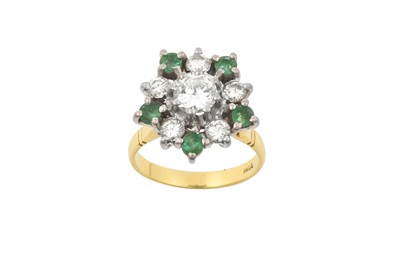 Lot 2194 - An Emerald and Diamond Cluster Ring the round...