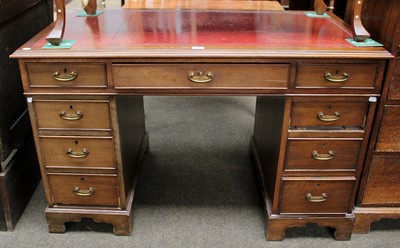 Lot 1142 - An Edwardian Mahogany Twin Pedestal Desk, with...