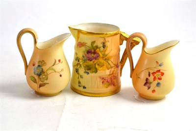 Lot 435 - A Royal Worcester barrel form jug with branch handle, printed and painted with flowers on a...